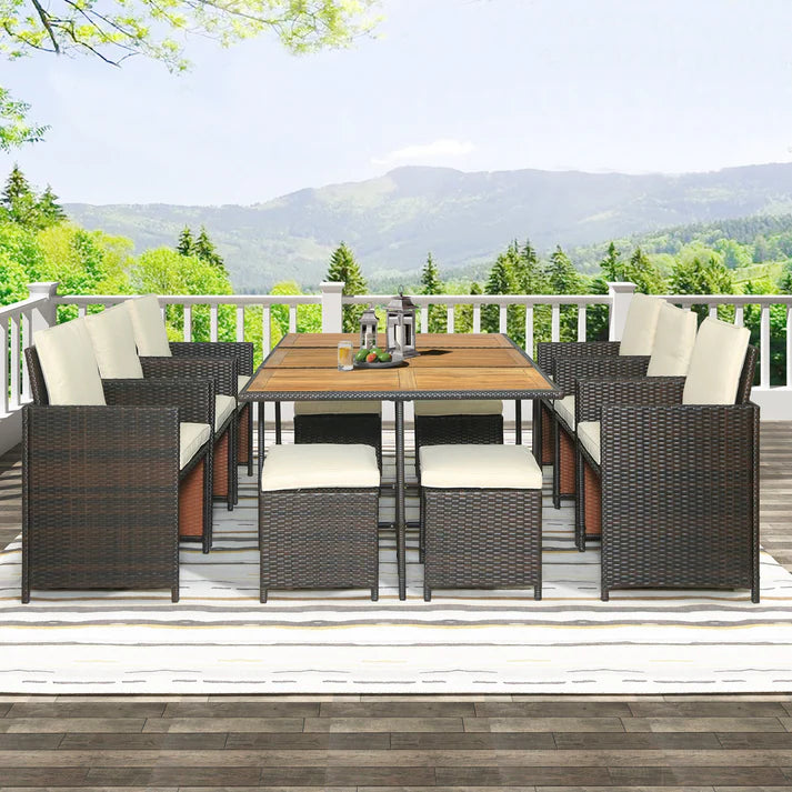 11 Piece Outdoor Dining Set with Wicker Chairs, Ottomans, and Acacia Wood Table
