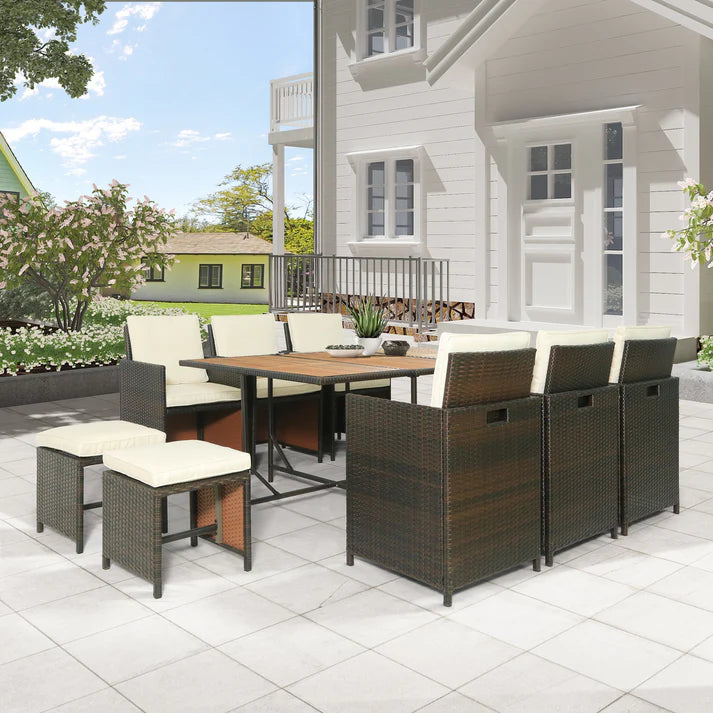 11 Piece Outdoor Dining Set with Wicker Chairs, Ottomans, and Acacia Wood Table